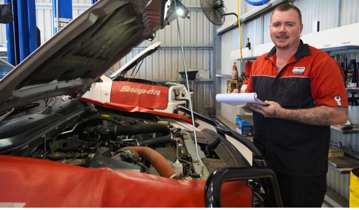 Mechanic working on car service for RoadPulse Automotive